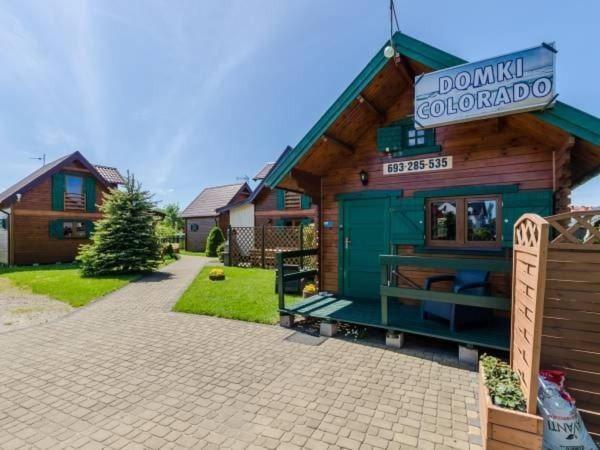 Villa Apartamentowe Domki Drewniane Colorado à Karwia Extérieur photo